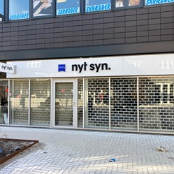 nyt-syn-facadebaand-udhaengskilt-ballerup